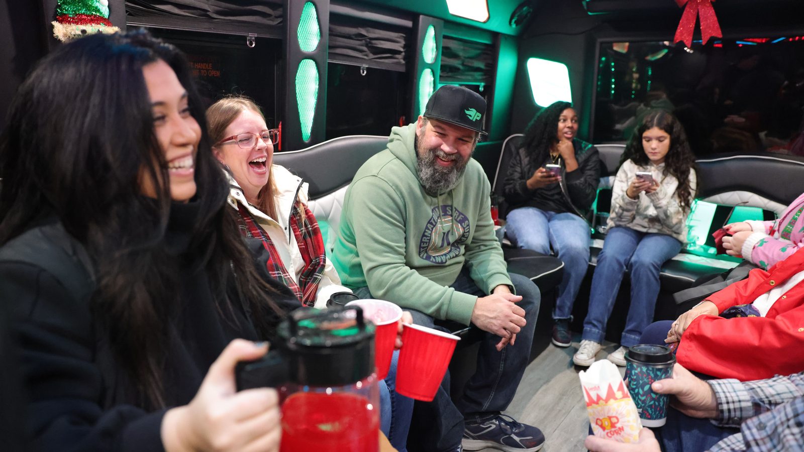 Party Sprinter limousine interior with perimeter seating and coloured lighting